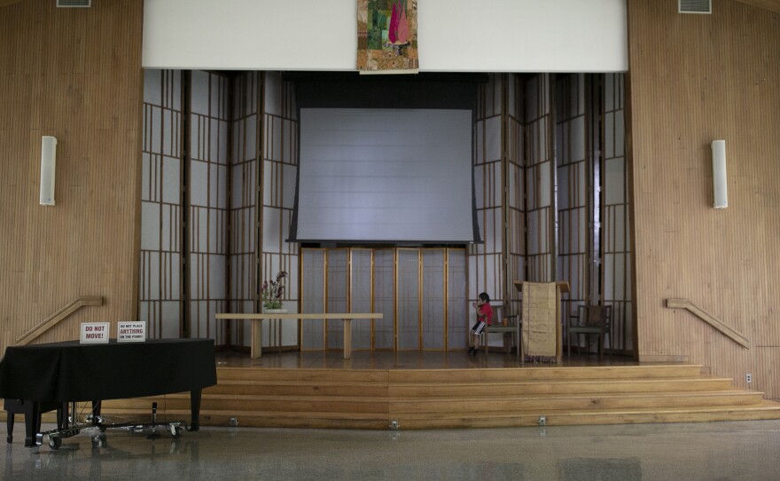 Rosa's 7-year-old son, John is diagnosed with Down Syndrome and plays video game in the church.