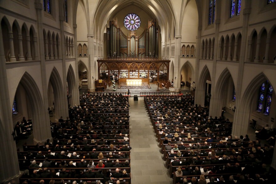 Guests are seated for the funeral for former President George H.W. Bush at St. Martin's Episcopal Church Thursday, Dec. 6, 2018, in Houston. 