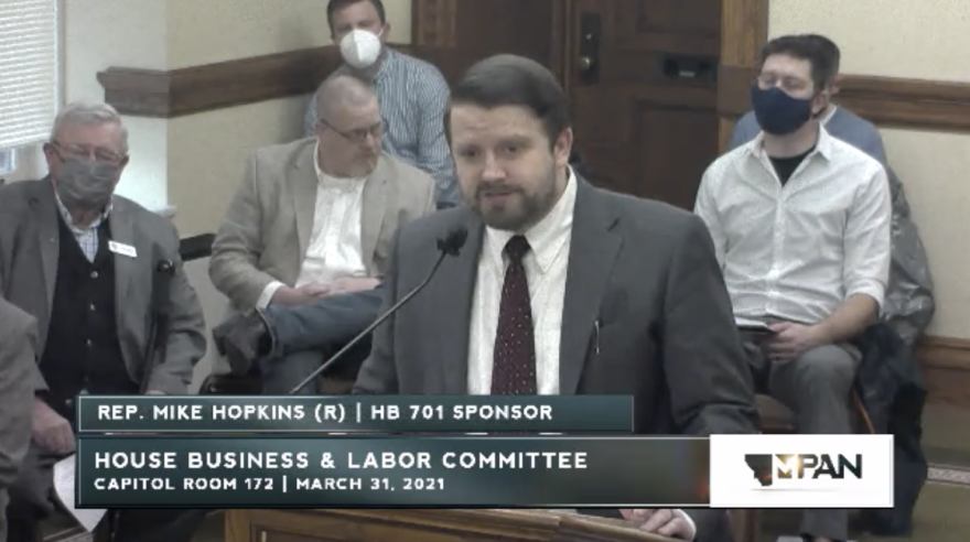 Montana Republican Rep. Mike Hopkins introduces House Bill 701 during a House Business and Labor Committee meeting on March 31, 2021.