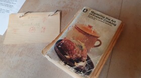 The well-loved Julia Child cookbook alongside Brigit Binn's cookbook she wrote in 6th grade.