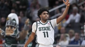 Michigan State guard Jase Richardson (11) reacts to a three-point basket against Oregon during the second half of an NCAA college basketball game in the quarterfinals of the Big Ten Conference tournament in Indianapolis, Friday, March 14, 2025.