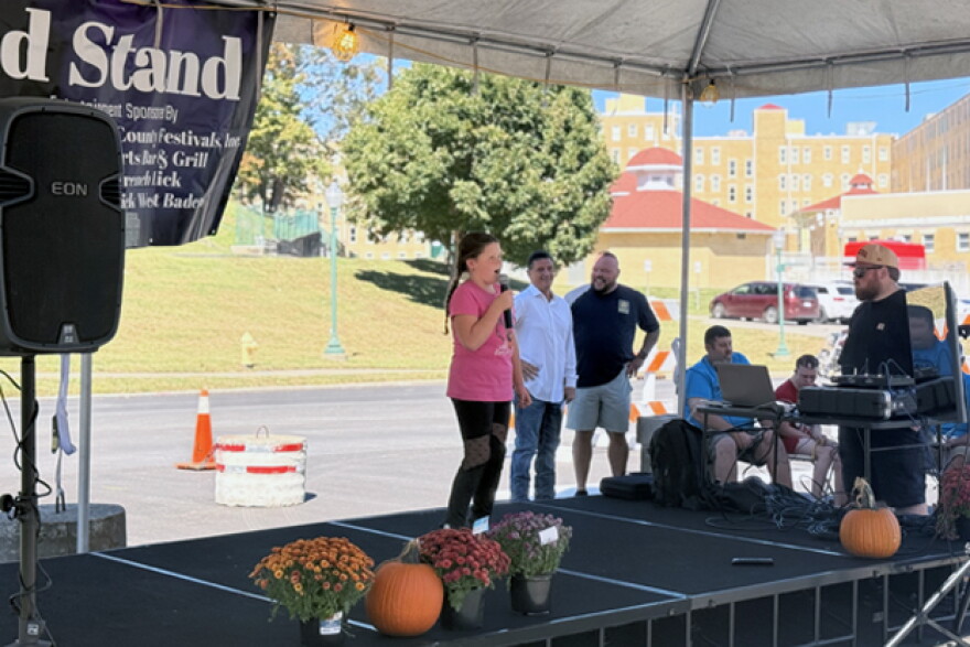 Izzy Jones sings on stage during the Orange County Pumpkin Festival karaoke contest Oct. 3. 
