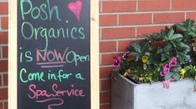 A shop on Main Street in Ashland, Ore, seeks clients as businesses begin to re-open after two months of pandemic-related closures.