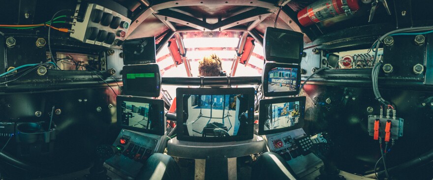 Eagle Prime co-pilot Gui Cavalcanti's view inside the robot is of seven different monitors that help him control the robot's legs. His co-pilot, Matt Oehrlein, sits in front of him during the duel.