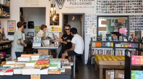People hang out at Deep Vellum Bookstore & Publishing Co. in the Deep Ellum district of Dallas on Friday, June 2, 2023.