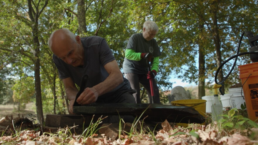 Carlo and Betty Mencucci restore gravestones in Burrillville.