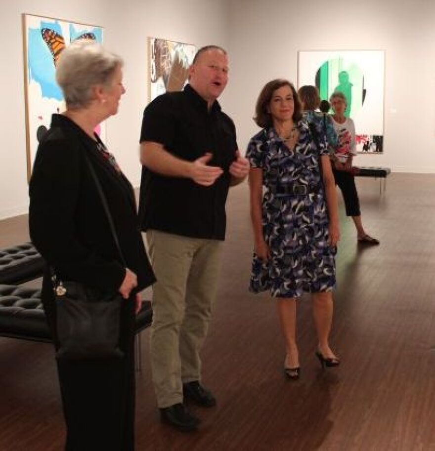Gallery Director Jade Dellinger at opening of Theo Wujcik exhibition in 2015.