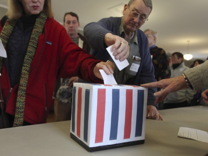 With its quirky caucuses and wacky candidate selection, the American political system may not be perfect, but it's a work in progress. Voters cast a ballot during the Harpswell Republican town caucus at the Old Orr's Island School House in Harpswell, Maine, on Feb. 11. 