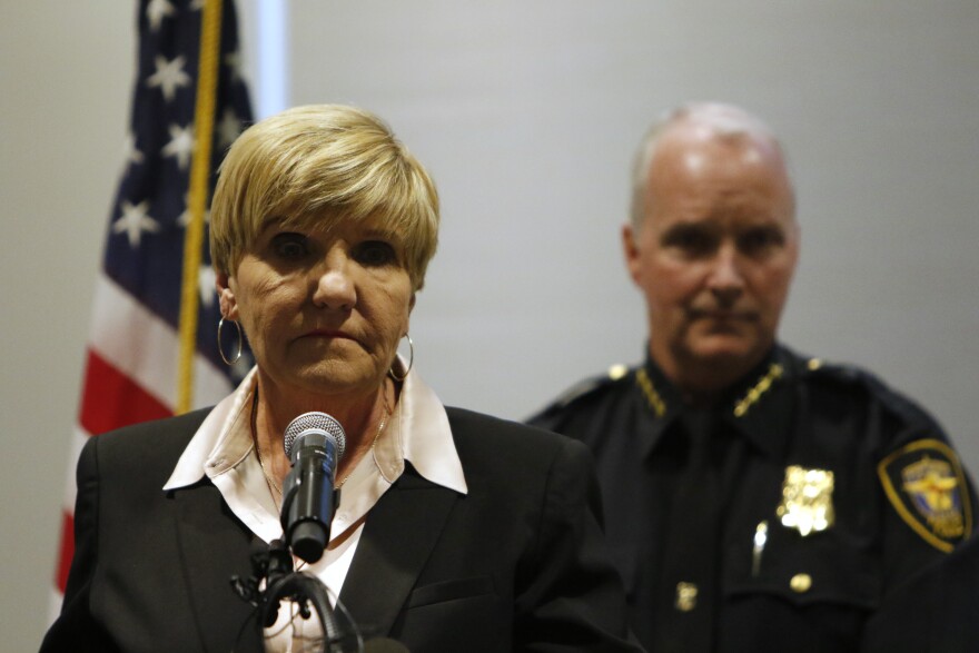 In this Oct. 14, 2019 file photo, Mayor Betsy Price speaks accompanied by interim police chief Ed Kraus at a news conference in Fort Worth, Texas, about former Fort Worth Police officer Aaron Dean shooting Atatiana Jefferson, 28, through a back window of her home in the early hours Saturday, Oct. 12, after a neighbor reported her front door was left open.