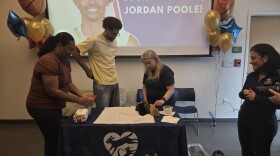 Pelicans guard Jordan Poole prepares to feed kittens at the Louisiana SPCA on Tuesday, March 10, 2026.