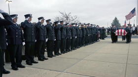 A Hamilton Fire Department honor guard carries the casket of Patrick Wolterman into the church in 2015. 
