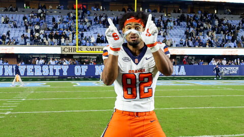 Linebacker Jamie Tremble (82, White) celebrates a victory over UNC on Saturday.