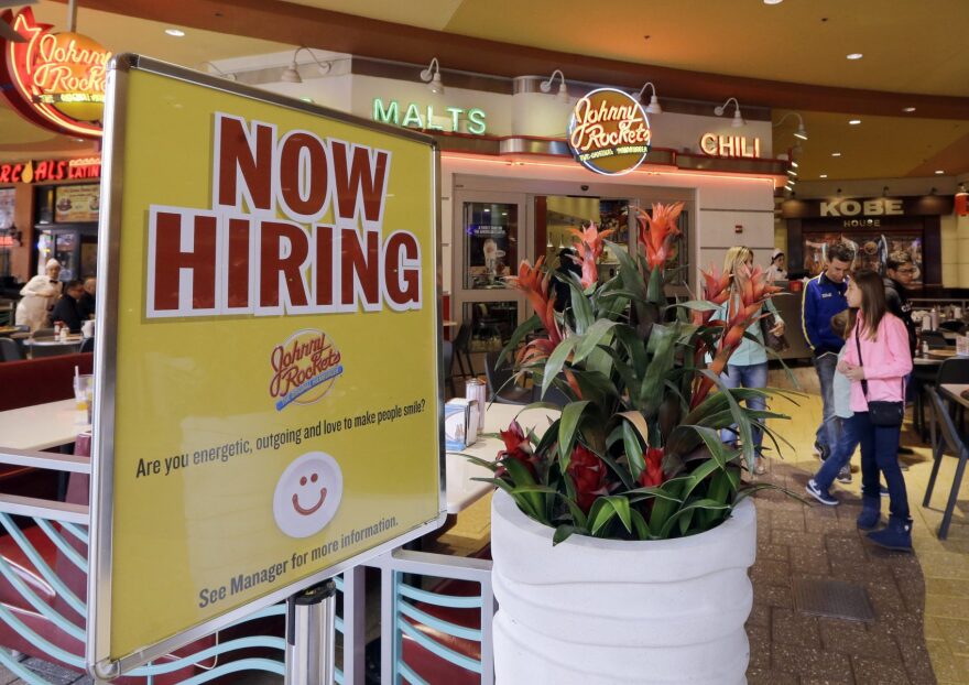 In this Feb. 9, 2016 file photo, a restaurant posts a sign indicating they are hiring, in Miami. (Alan Diaz/AP Photo)