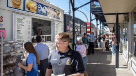 Fall Festival attendees order food from booths on Tuesday of the festival. Non-profits earn money form their booths, and the Nut Club fundraises significantly from the half-pot raffle.
