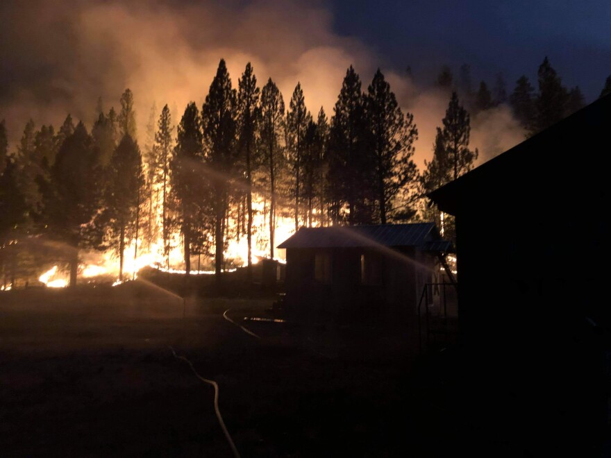  Fire fighters defend buildings from the Bootleg Fire in Klamath County.