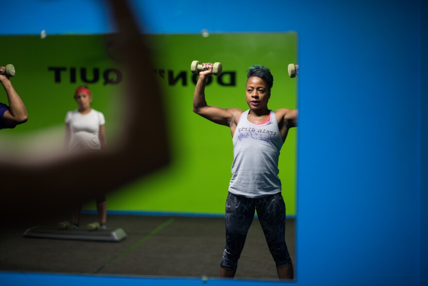 Samantha Pierce works out during a hip-hop aerobic class at Naturally Gifted Fitness Center in Cleveland Heights. Exercise is how she copes with the stresses in her life.