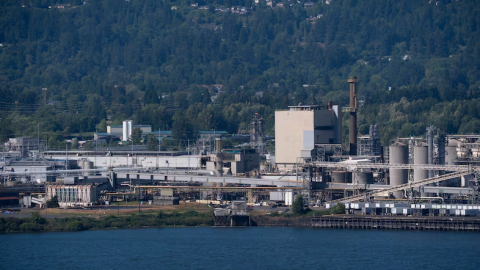 Nippon Dynawave Packaging Co. sits on the Columbia River, in Longview, Wash., on May 27, 2026. Contamination entered the river following the plant’s chemical disaster, but state officials quickly worked to control further contamination.