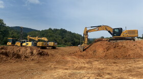 Heavy machinery on site at the former Poage Farm, as developer ABoone Real Estate and site contractor Bowman Excavating work to build 118 single-family homes.