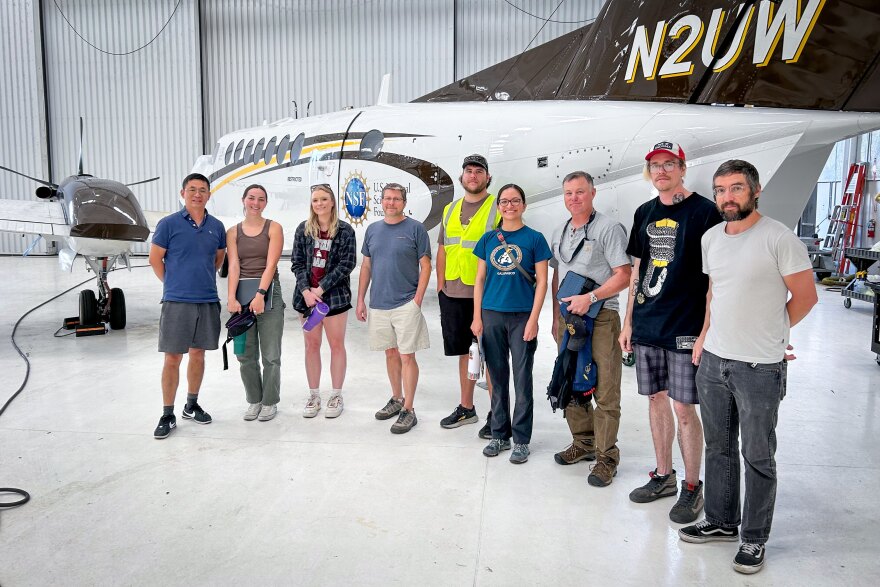 The research team from the University of Wyoming, University of Montana, Colorado State University, Utah Division of Air Quality, NASA and the National Center for Atmospheric Research stands in front of the University of Wyoming’s King Air research aircraft, Aug. 3, 2026.