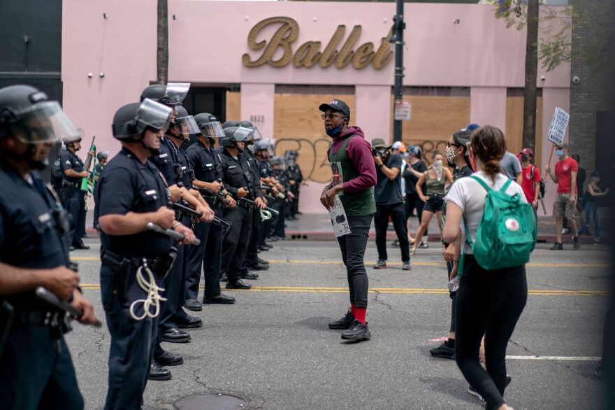 Protesters face police in Hollywood on June 2 during a demonstration over Floyd's death.