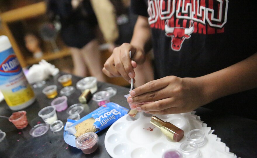 Students have learned about using materials like hibiscus flowers, beet root, aloe, rose water and oil for their lip glosses.