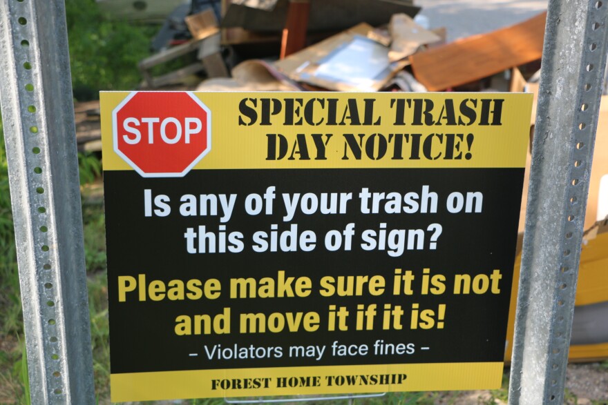 In an effort to keep trash off the side of state highways during their annual Spring Cleanup, Forest Home Township officials tried a simple sign. (Photo : Austin Rowlader / IPR News)