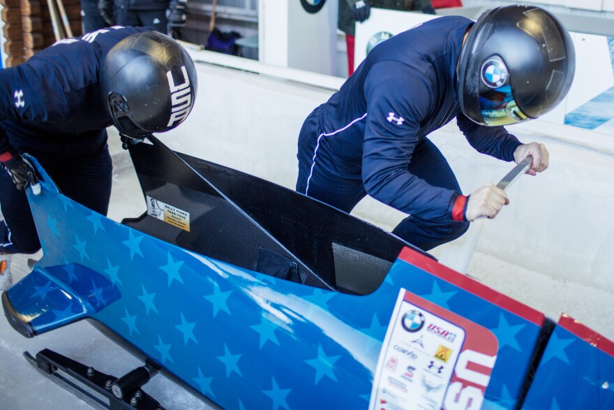 U.S. National team member, Carlo Valdes, left, and Codie Bascue, right, push off from the start for their training run in Lake Placid.