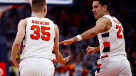 Buddy Boeheim (left) and Cole Swider (right) celebrate another Orange made bucket.