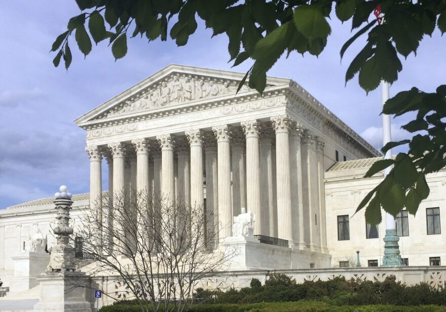 This April 23, 2018, file photo shows the Supreme Court in Washington. The Supreme Court says states can force online shoppers to pay sales tax. The 5-4 ruling Thursday is a win for states, who said they were losing out on billions of dollars annually under two decades-old Supreme Court decisions that impacted online sales tax collection. The high court ruled Thursday to overturn those decisions. (AP Photo/Jessica Gresko, File)