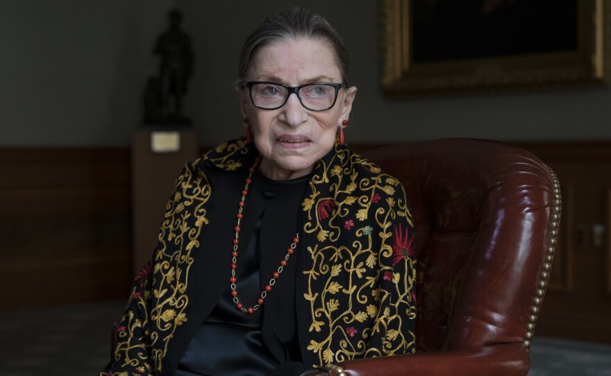 Supreme Court Justice Ruth Bader Ginsburg — here in her chambers during a 2019 interview with NPR's Nina Totenberg — died Sept. 18, 2020, at the age of 87.