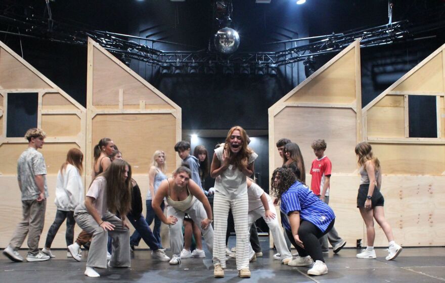 Scene from musical number 'That's Not My Name.'