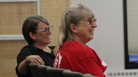 Susanna Litwiniak (left) and Annette Weigle (right) attend a Kenai Peninsula Borough School District school board meeting on Monday, Sept. 14, 2026 in Soldotna, Alaska.