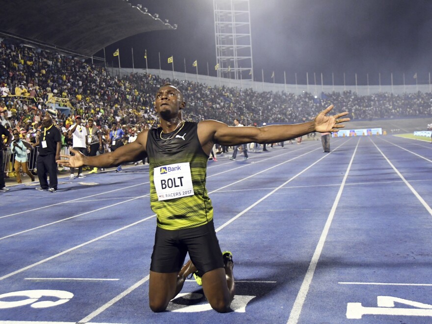 Jamaica's Usain Bolt celebrates after winning the "Salute to a Legend " 100 meters during the Racers Grand Prix n Kingston, Jamaica, Saturday, June 10, 2017. Bolt is set to run his final 100 meters at the World Championships on Saturday in London.