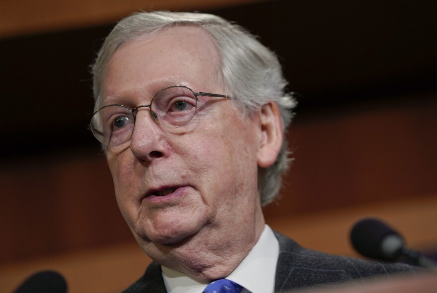 Senate Majority Leader Mitch McConnell speaks to members of the media at the Capitol in Washington, Wednesday, Nov. 7, 2018.