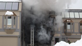 A condo on Sorbus Way in Midtown Anchorage went up in flames on Friday, Nov. 24, 2023. (Wesley Early/Alaska Public Media)