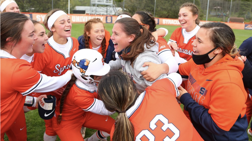 Head coach Shannon Doepking celebrates with her players after clinching an ACC Tournament berth in 2021.