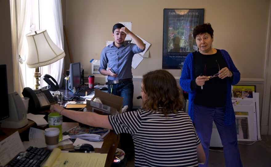Younes talks with a current intern and Harriet Lesser, the 2012-2013 season curator, at The Mansion at Strathmore during work. He previously interned at the gallery when he was female and had a smooth transition when he returned. He was a visual arts assistant there but has since changed jobs.