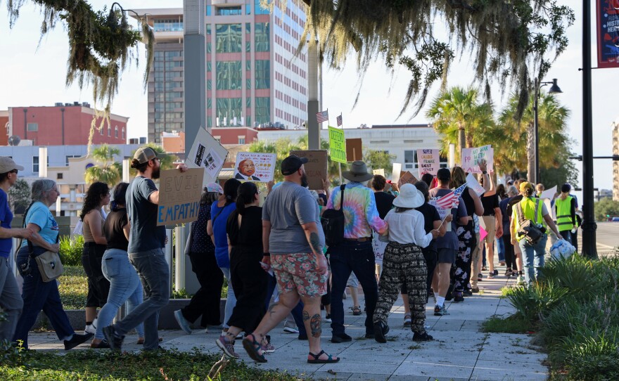 The protestors begin to march from the steps of the Old Florida Capitol around the Florida Capitol Complex.