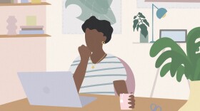 A woman works at home on the computer. (Getty Images)