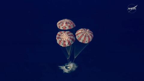 In this image from video provided by NASA, the Artemis II Orion capsule splashes down in the Pacific Ocean, on Friday, April 10, 2026. (NASA via AP)