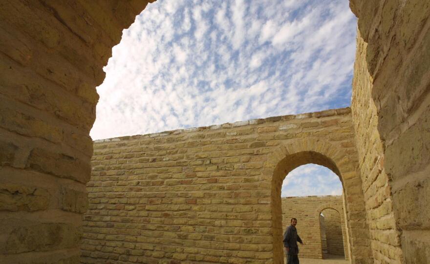 An Iraqi walks around the House of Abraham in the biblical city of Ur, in southern Iraq, in 2002. It is one of the sites Pope Francis is scheduled to visit on his trip to Iraq in March.