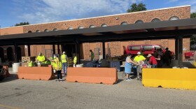 Volunteer staff assist clients at St. Vincent de Paul Food Pantry during food distribution.