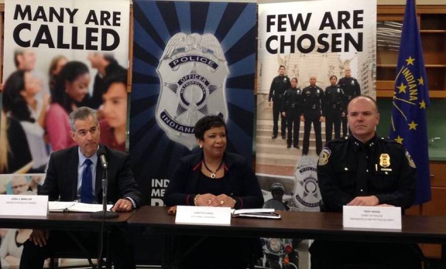 U.S. Attorney General Loretta Lynch, center, met with police recruits, officers and community members during a visit to Indianapolis Wednesday, April 13, 2016. On her left is U.S. Attorney Josh Minkler. On her right, Indianapolis Chief of Police Troy Riggs.