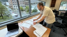 a person looks over papers