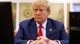 Former U.S. President Donald Trump sits in New York State Supreme Court during his civil fraud trial in New York City.