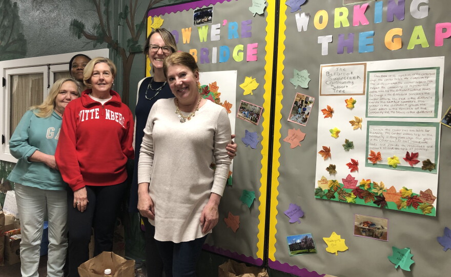 Staff members at The Bellbrook Sugarcreek Community Support Center: Kelsey Hurlburt, Executive Director (2nd from right); Jamie Oliver, Greene County Strong Families Case Manager; Charley B., St. Francis Fellow; Shari Chestnut, Office Manager, and Cindy Comperchio, Development Manager.