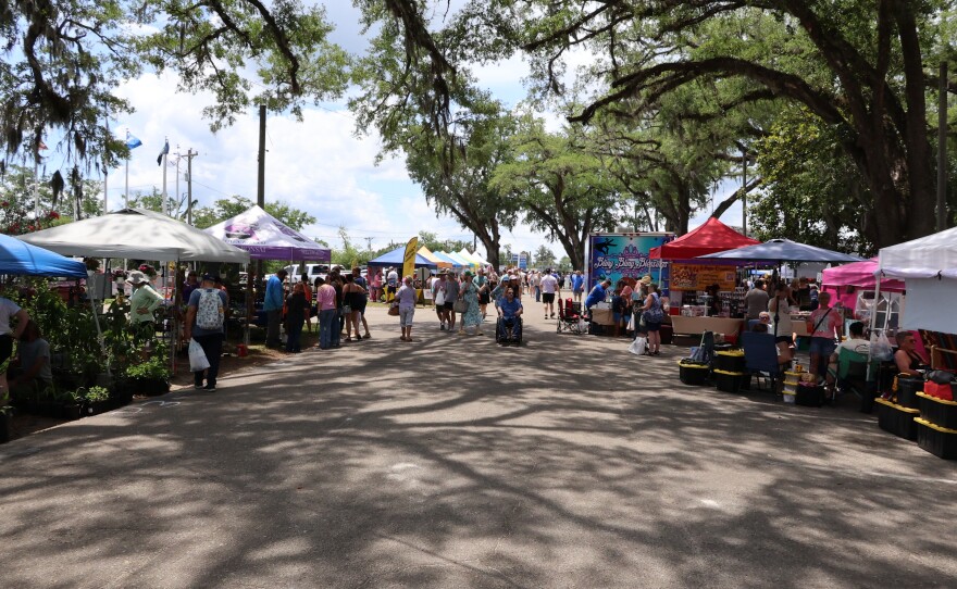 Vendors line up to provide their wares for the local community during annual Tupelo Honey Festival.