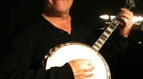 John Patrick Lowrie holds the 1920s banjo he plays in Seattle Opera's "Porgy and Bess."