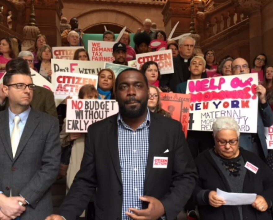 Stanley Fritz of Citizen Action is one of many who spoke against the state budget's priories at a rally on the Million Dollar Staircase at the New York State Capitol on Wednesday.