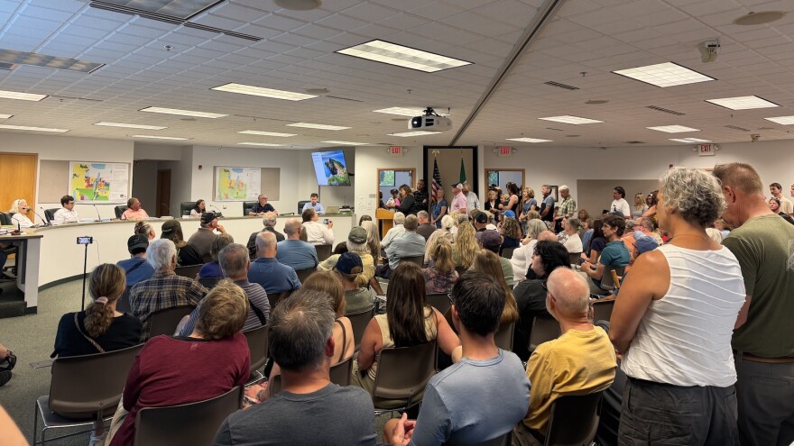 The crowd at Wednesday's Garfield Township Planning Commission meeting. At least 100 people were in attendance, mostly to support a possible moratorium on data centers. (Photo: Vivian La/IPR News)
